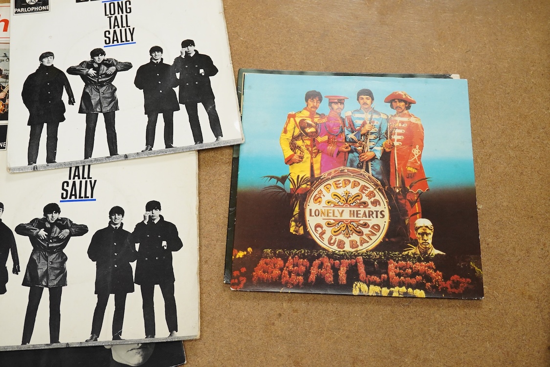 Fifteen The Beatles 7” singles, all in pictures sleeves, including; Extracts from A Hard Days Night, The Beatles Million Sellers, Twist and Shout, Hello Goodbye, Lady Madonna, etc., including several foreign issues